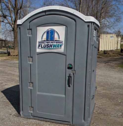 Wheelchair accessible portable toilet with ground level entry
